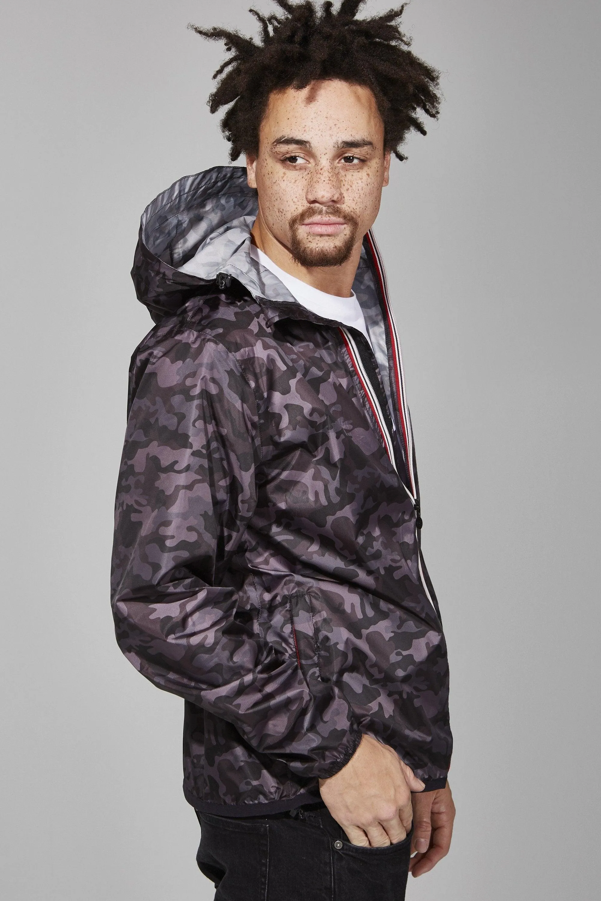 Black camo full zip packable rain jacket and windbreaker